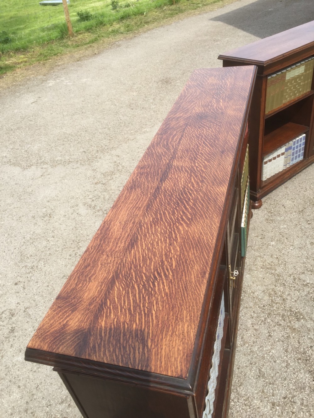Pair of Waring and Gillow solid oak open bookcases circa 1920 View VI