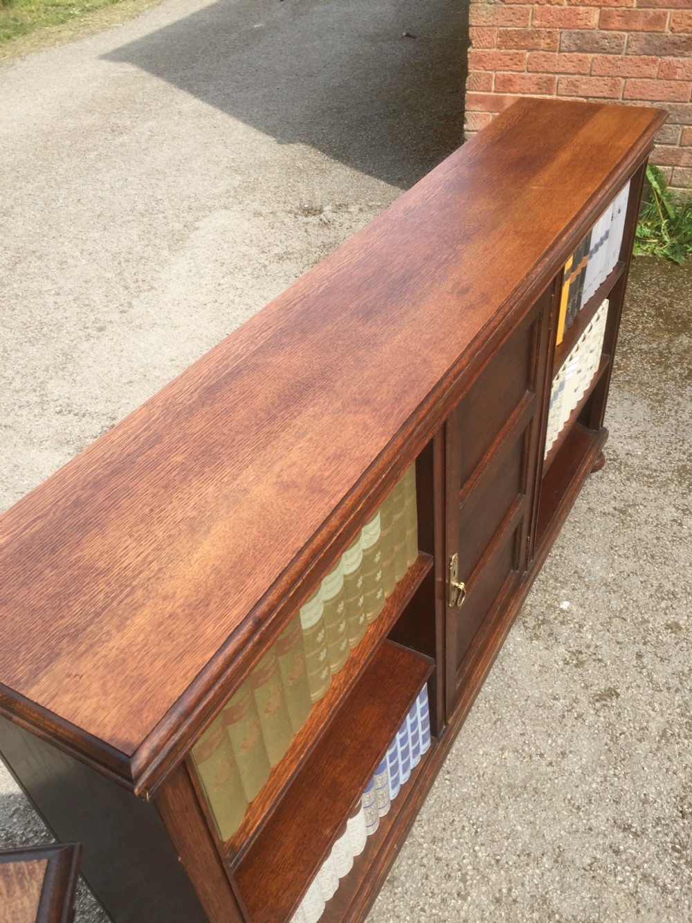 Pair of Waring and Gillow solid oak open bookcases circa 1920 View VII