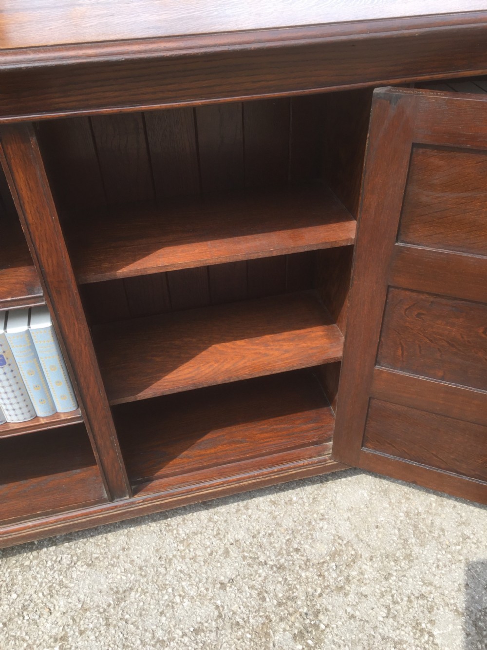 Pair of Waring and Gillow solid oak open bookcases circa 1920 View XI