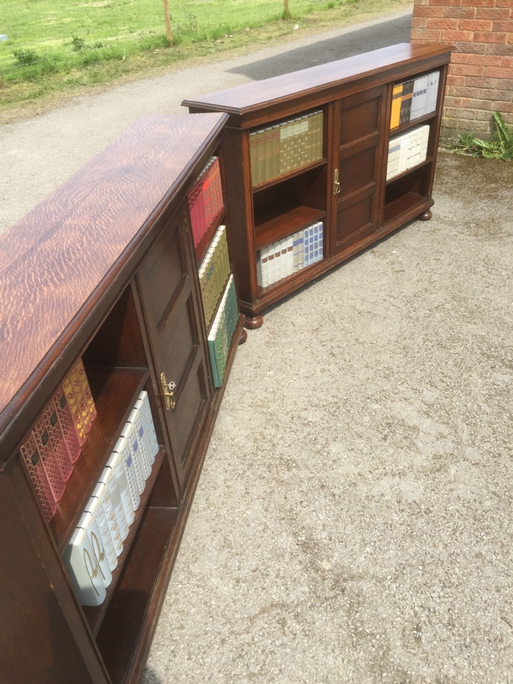 Pair of Waring and Gillow solid oak open bookcases circa 1920 View XVI