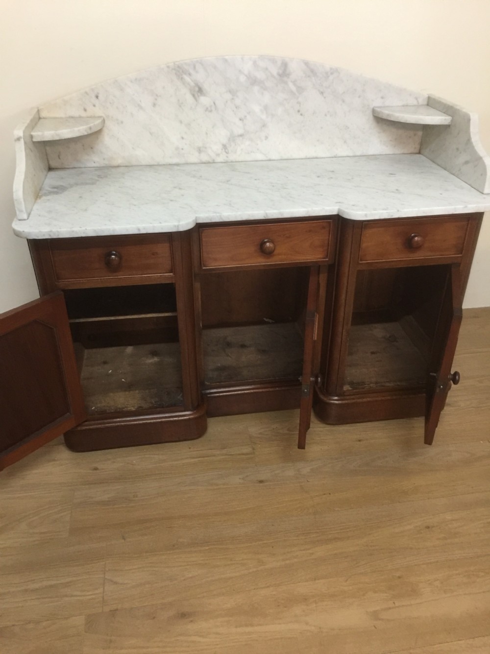 Nineteenth century mahogany washstand with white carrara marble top  View V