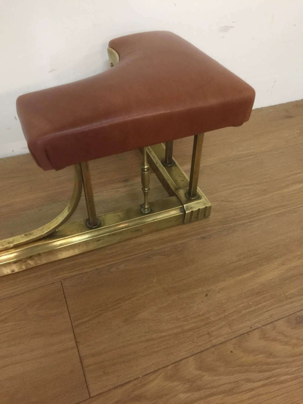 Edwardian leather and brass club fender View III