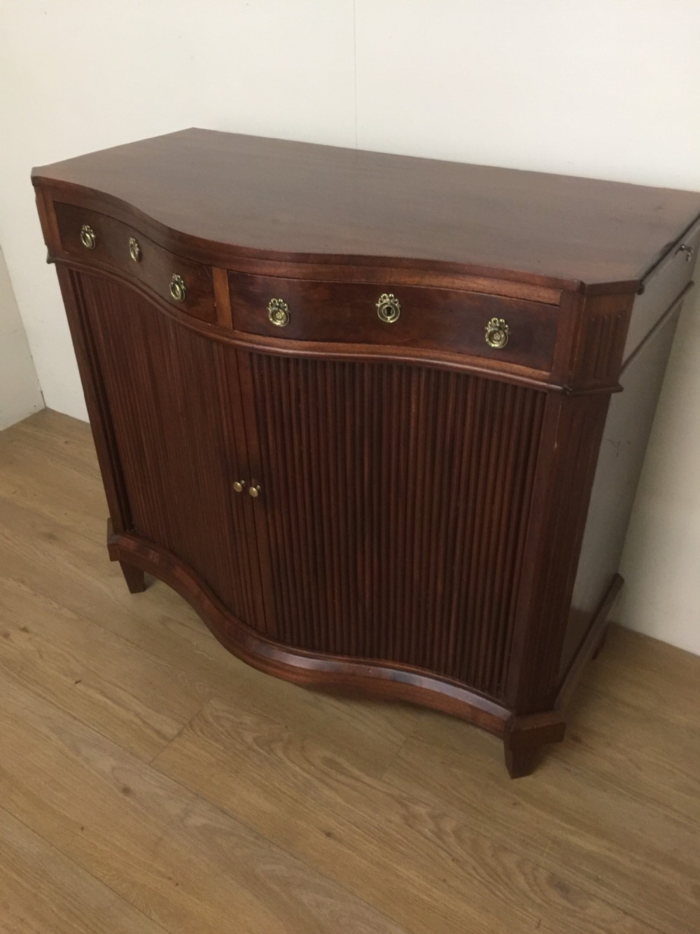 Nineteenth century serpentine fronted tambour cabinet  View II