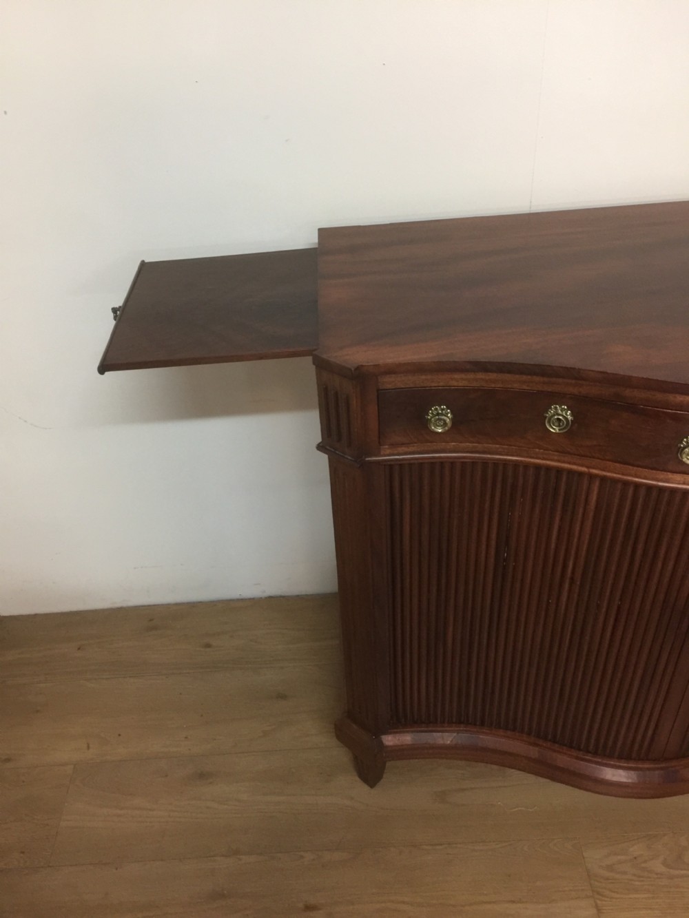 Nineteenth century serpentine fronted tambour cabinet  View V