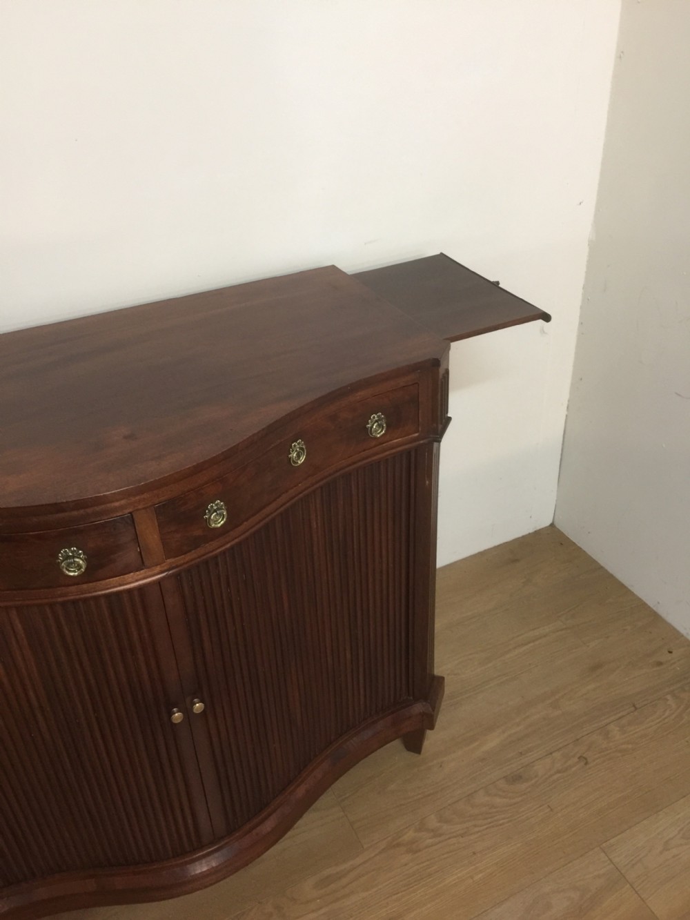 Nineteenth century serpentine fronted tambour cabinet  View VI
