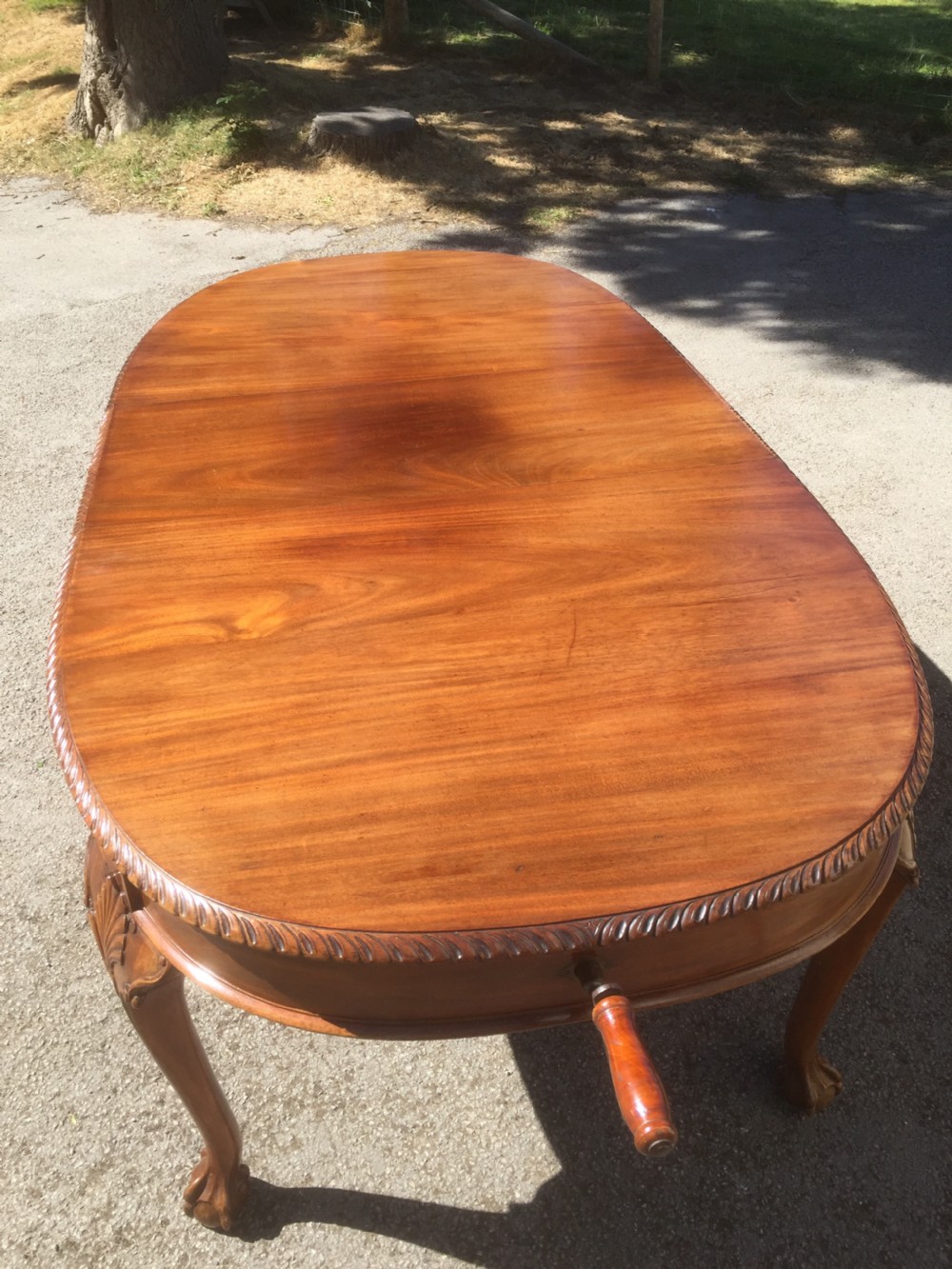 Edwardian eight seater walnut wind out dining table on cabriole legs  View IV