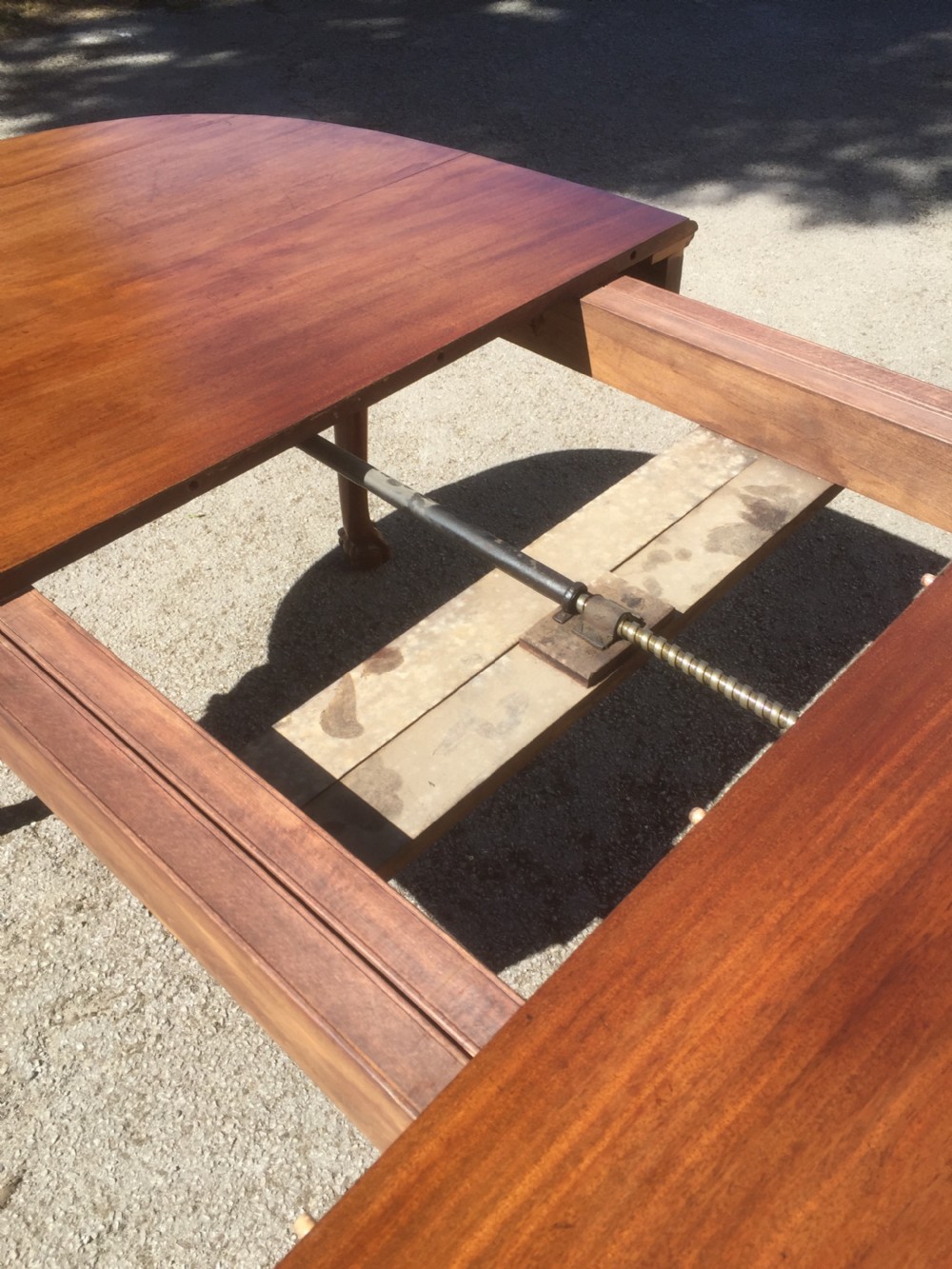 Edwardian eight seater walnut wind out dining table on cabriole legs  View IX