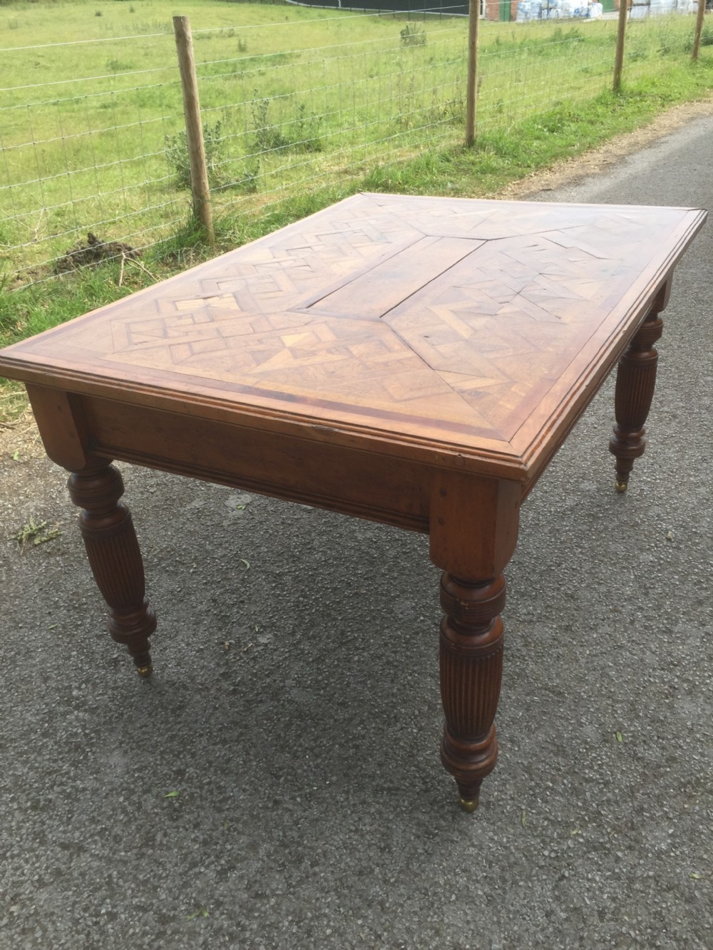 Nineteenth century oak parquetry six seater table on turned and reeded legs  View IV