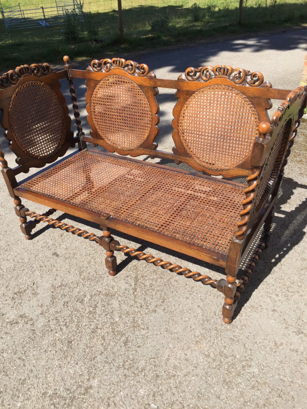 Edwardian oak Jacobean style Bergere  sofa View II