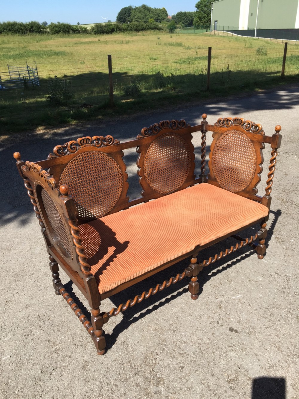 Edwardian oak Jacobean style Bergere  sofa View III