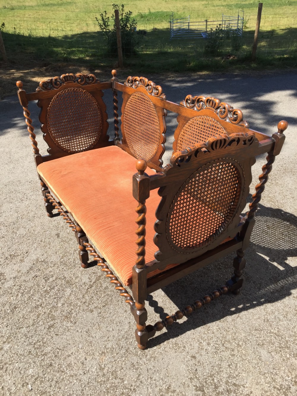 Edwardian oak Jacobean style Bergere  sofa View IV
