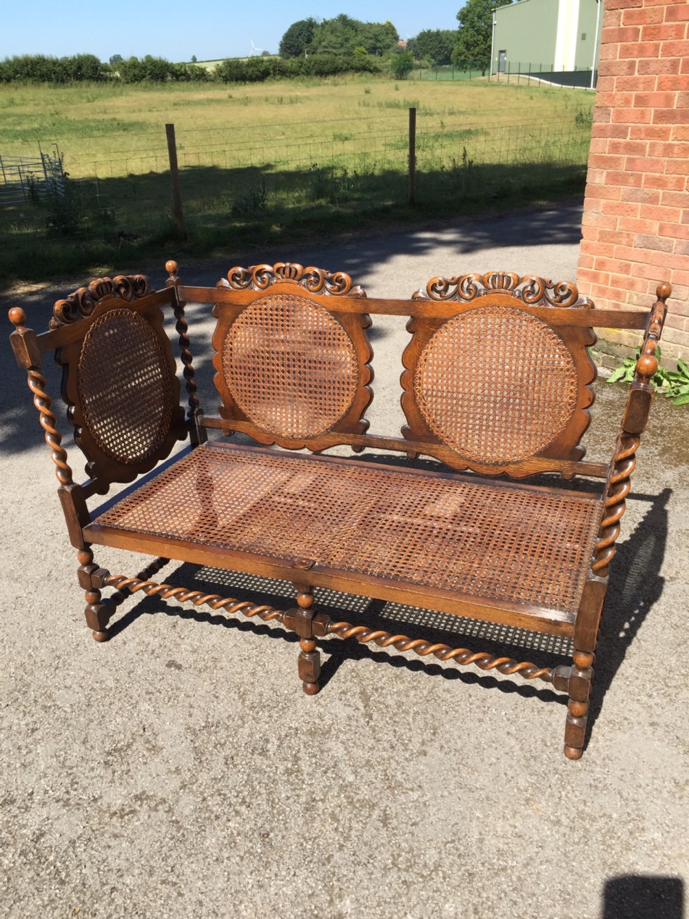 Edwardian oak Jacobean style Bergere  sofa View XIII