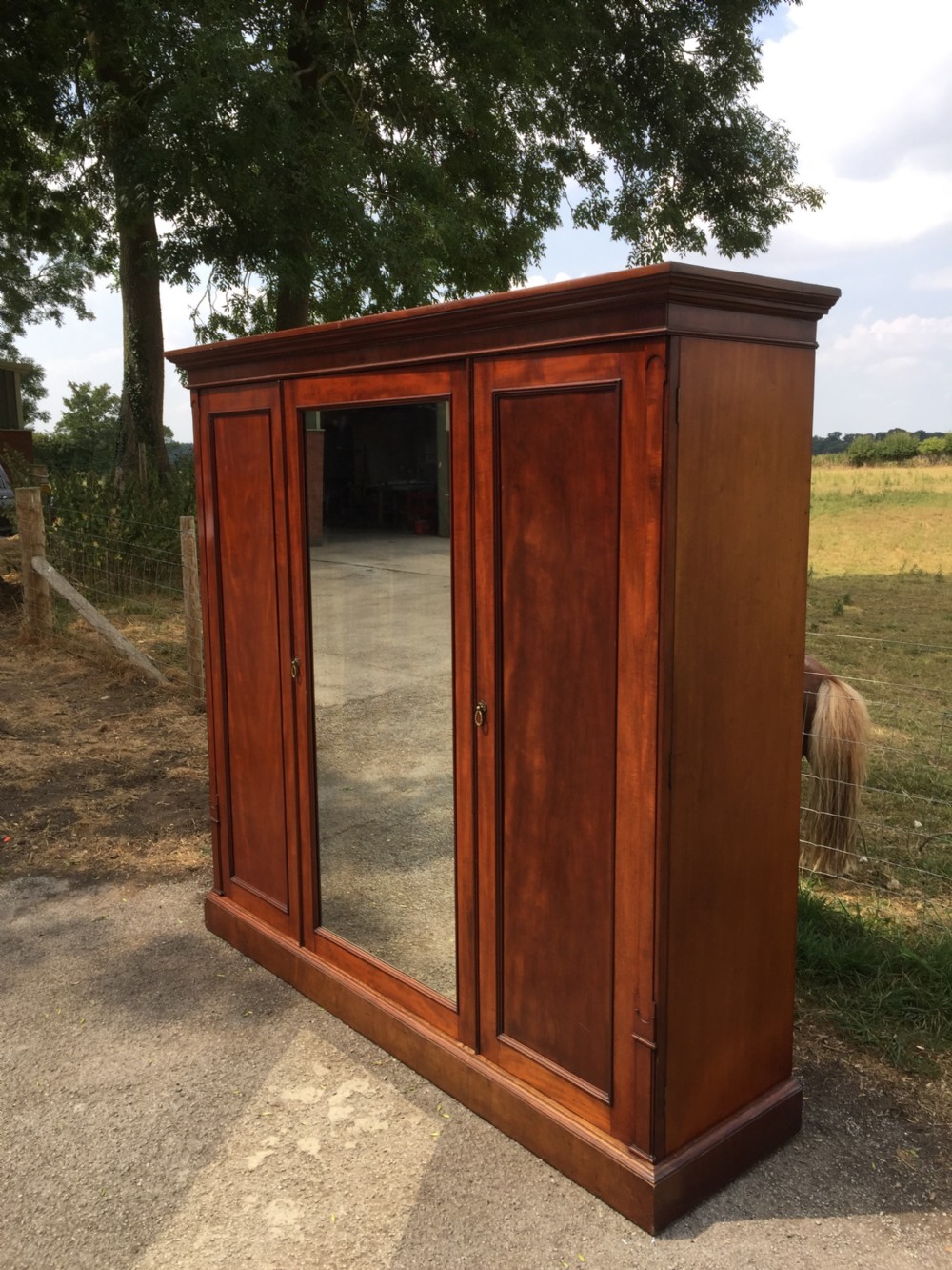 Nineteenth century mahogany triple wardrobe  View II
