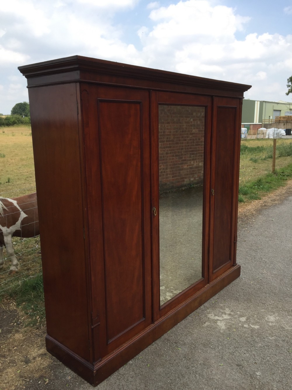 Nineteenth century mahogany triple wardrobe  View IV