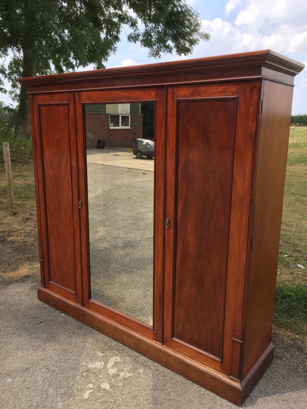 Nineteenth century mahogany triple wardrobe  View X
