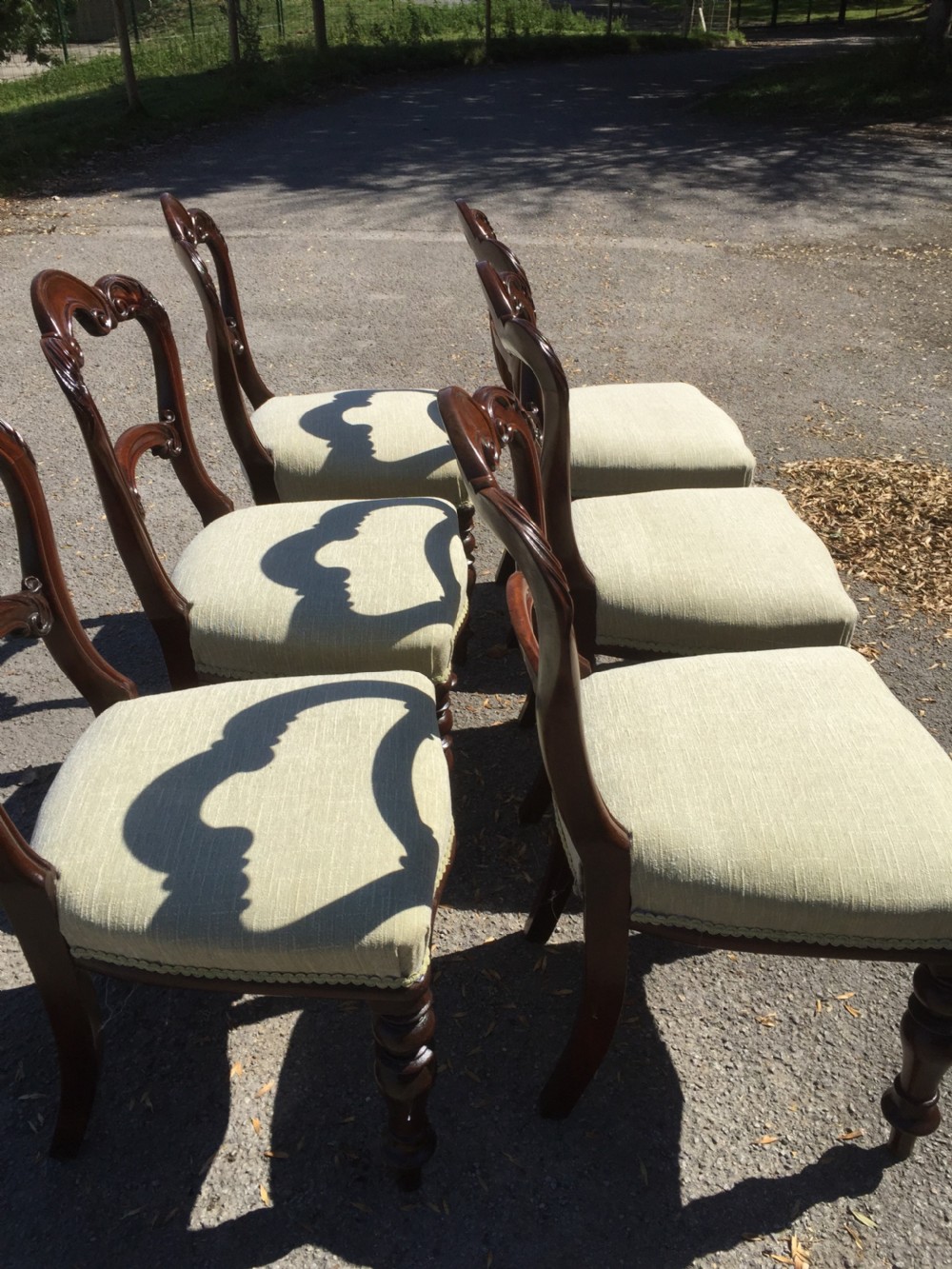 Six nineteenth century carved mahogany balloon backed dining chairs  View X