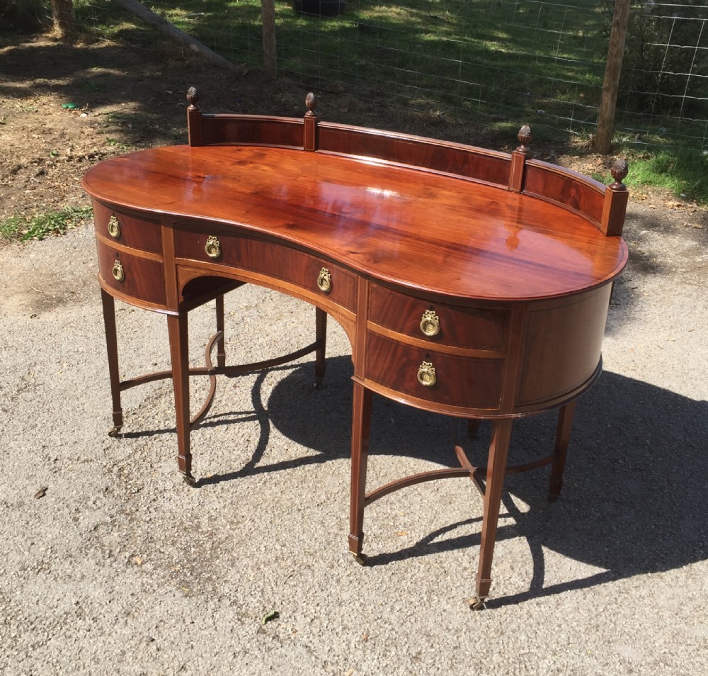 Nineteenth century inlaid mahogany kidney shaped desk