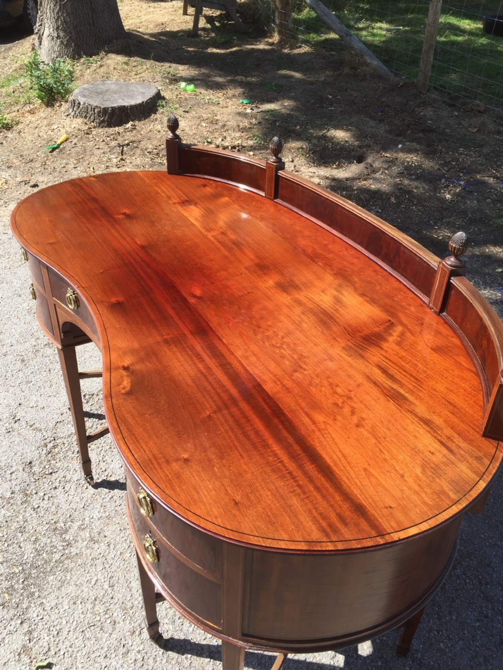 Nineteenth century inlaid mahogany kidney shaped desk View II