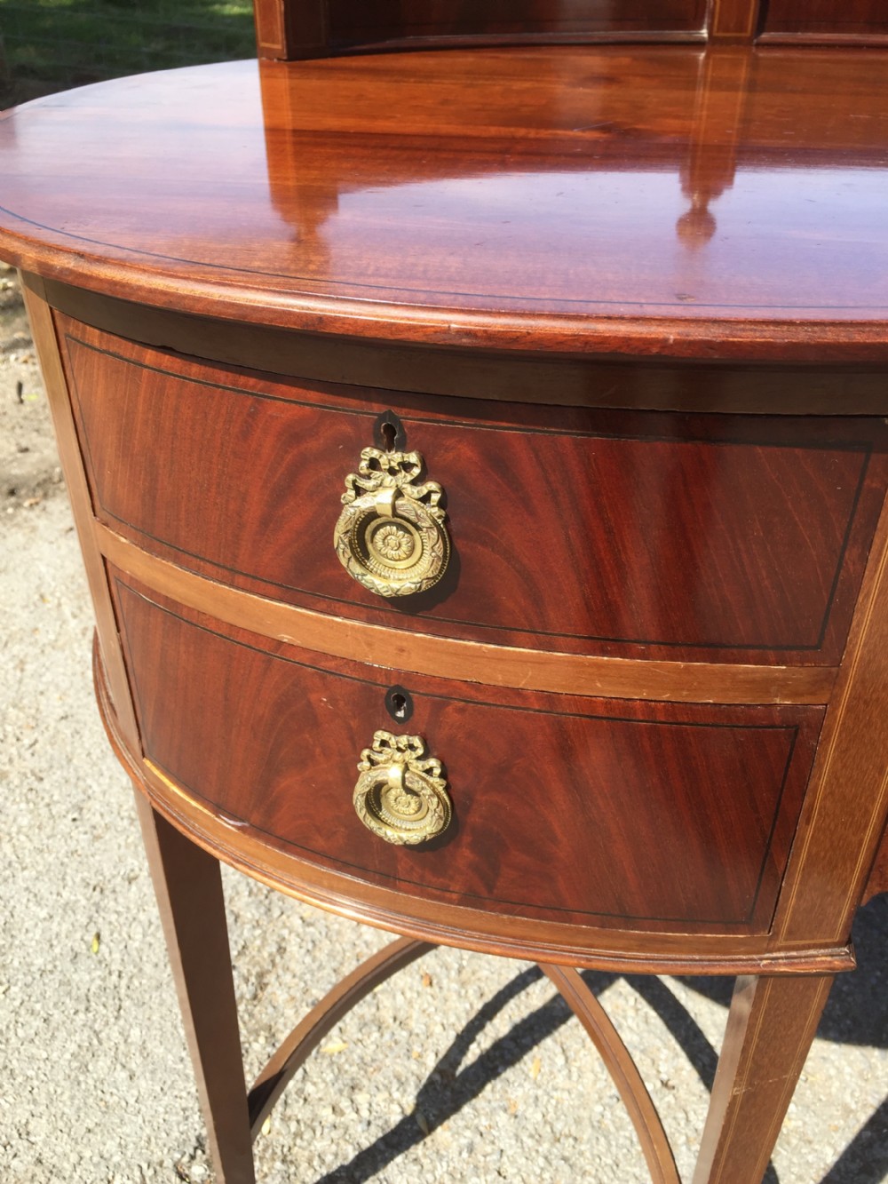 Nineteenth century inlaid mahogany kidney shaped desk View IV