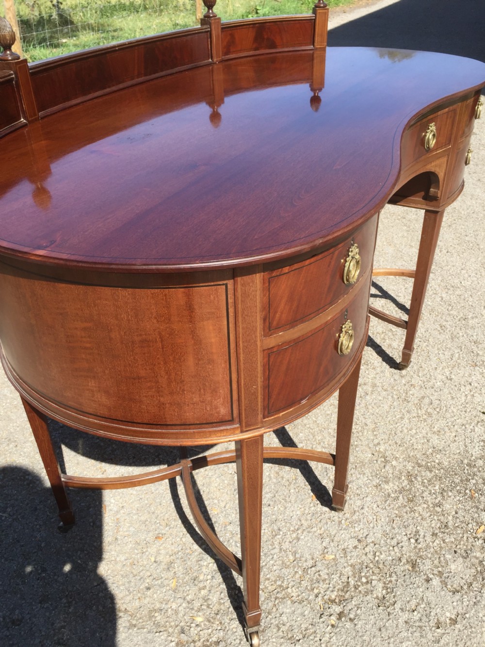 Nineteenth century inlaid mahogany kidney shaped desk View VI
