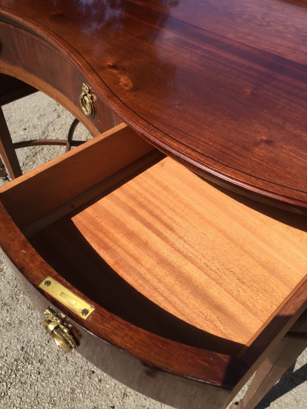 Nineteenth century inlaid mahogany kidney shaped desk View IX