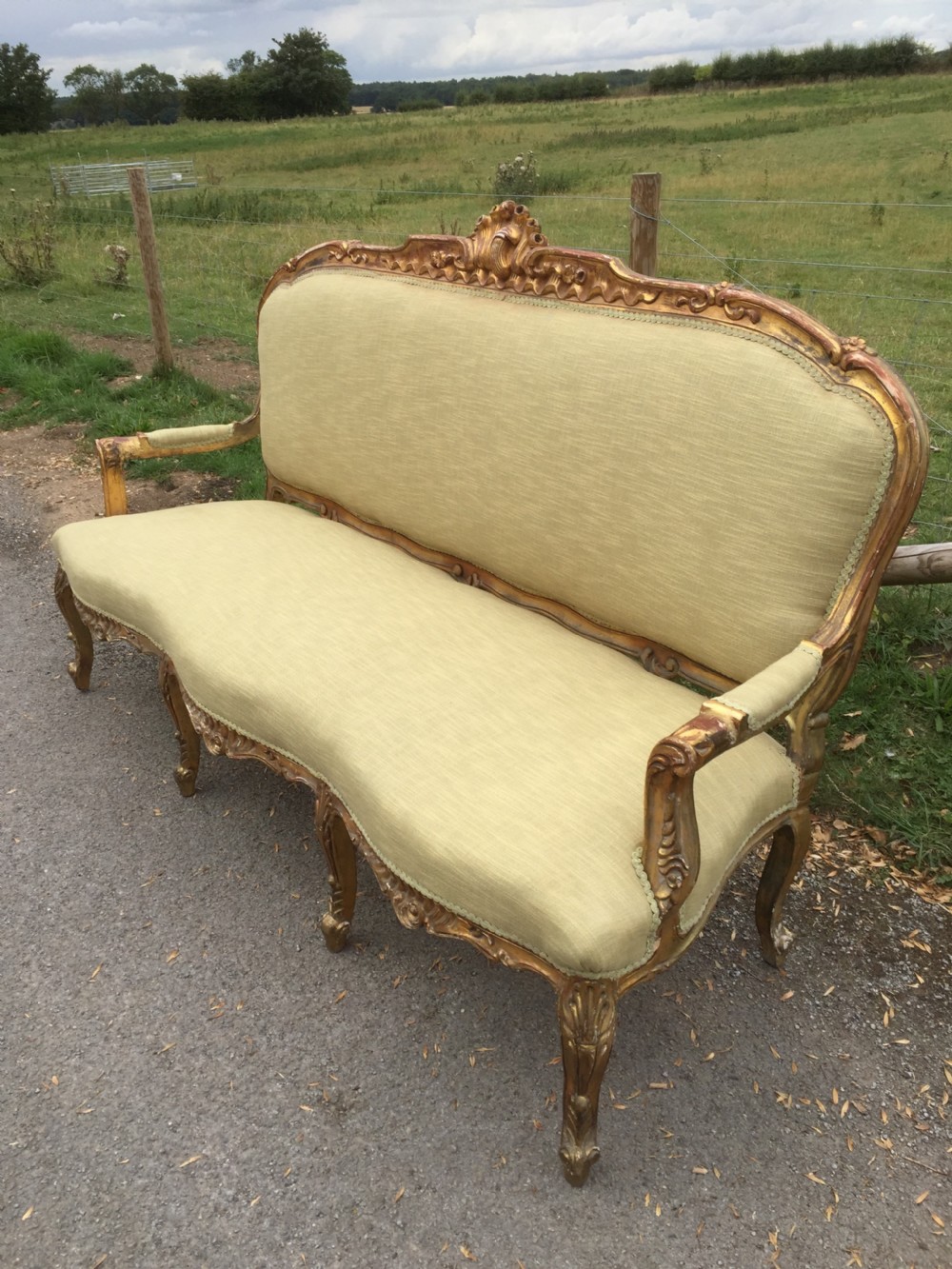 French three seater sofa with carved and gilded frame circa 1900 View II