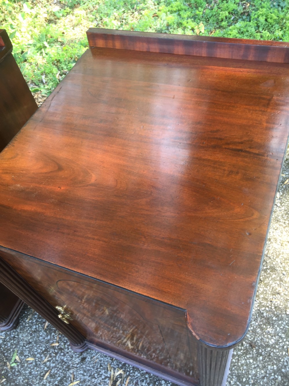 Pair of nineteenth century flame mahogany inlaid bedside cupboards View III