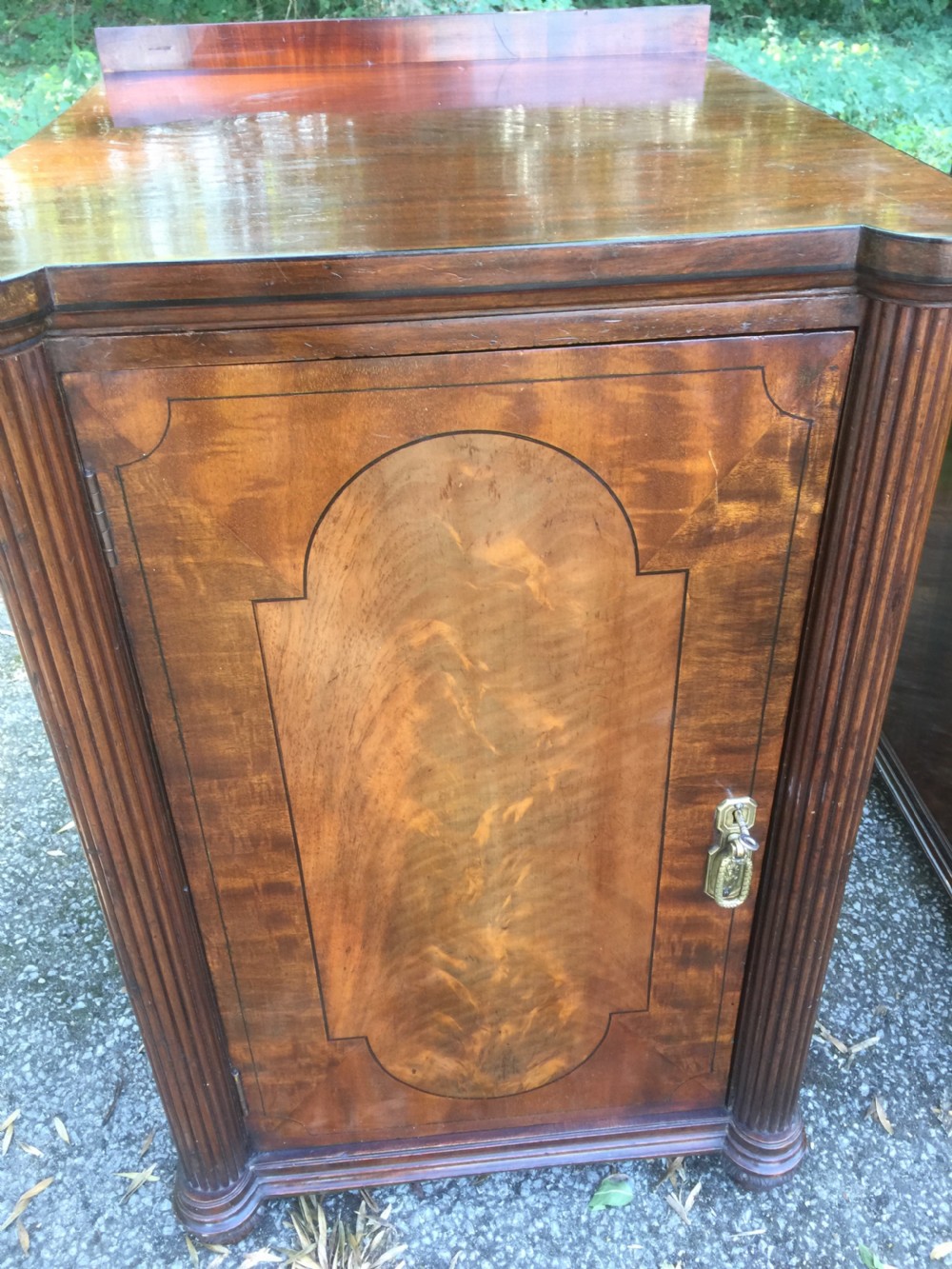 Pair of nineteenth century flame mahogany inlaid bedside cupboards View VI
