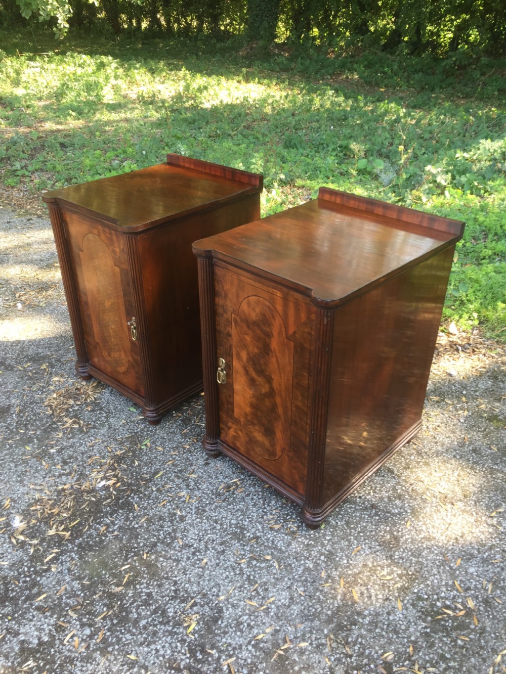 Pair of nineteenth century flame mahogany inlaid bedside cupboards View XI