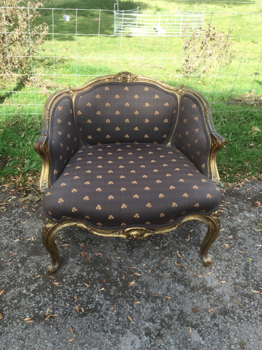 Late nineteenth century French armchair with scrolling gilt frame  View II