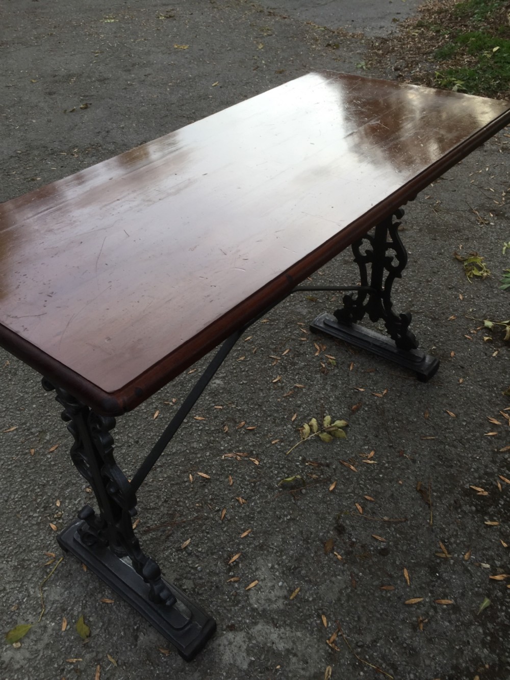Antique cast iron pub table with mahogany top View III