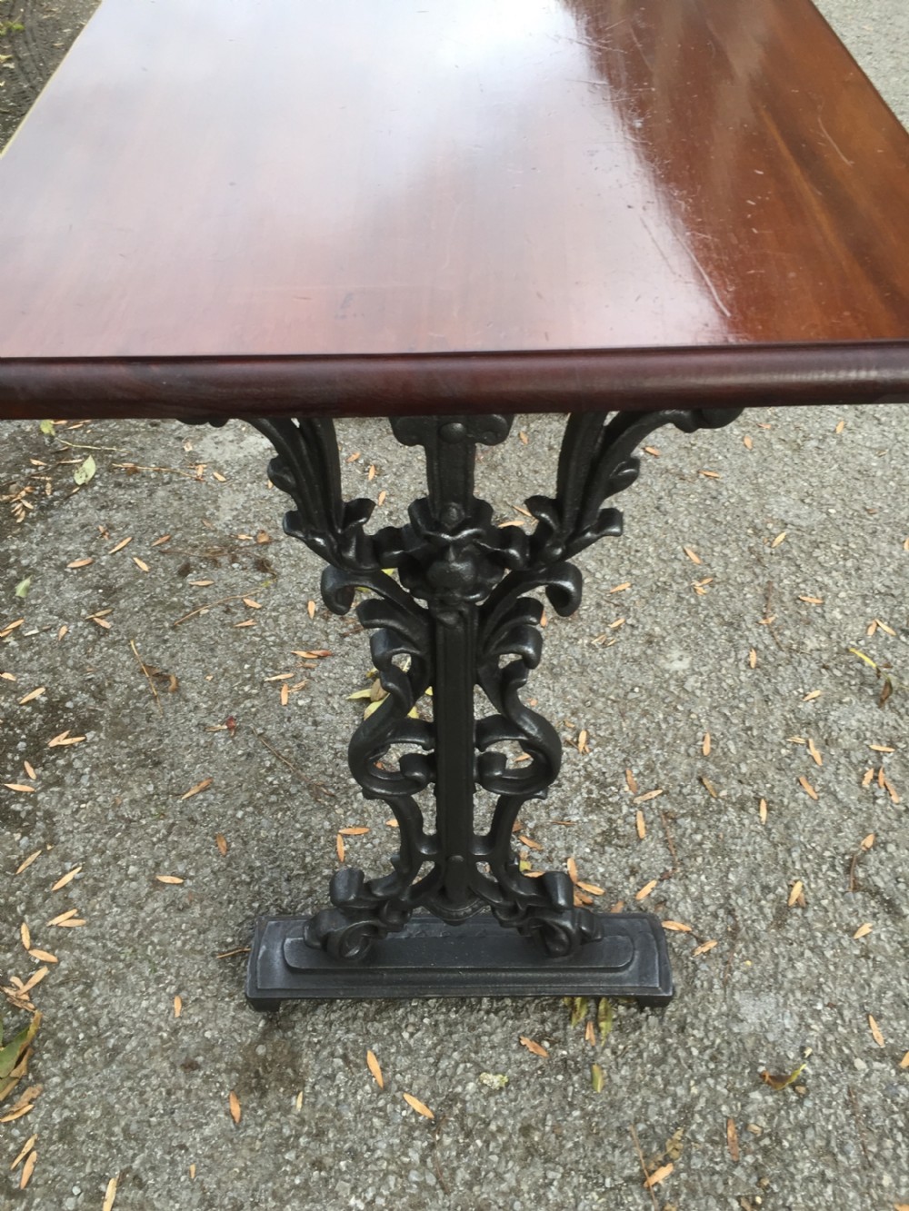 Antique cast iron pub table with mahogany top View V