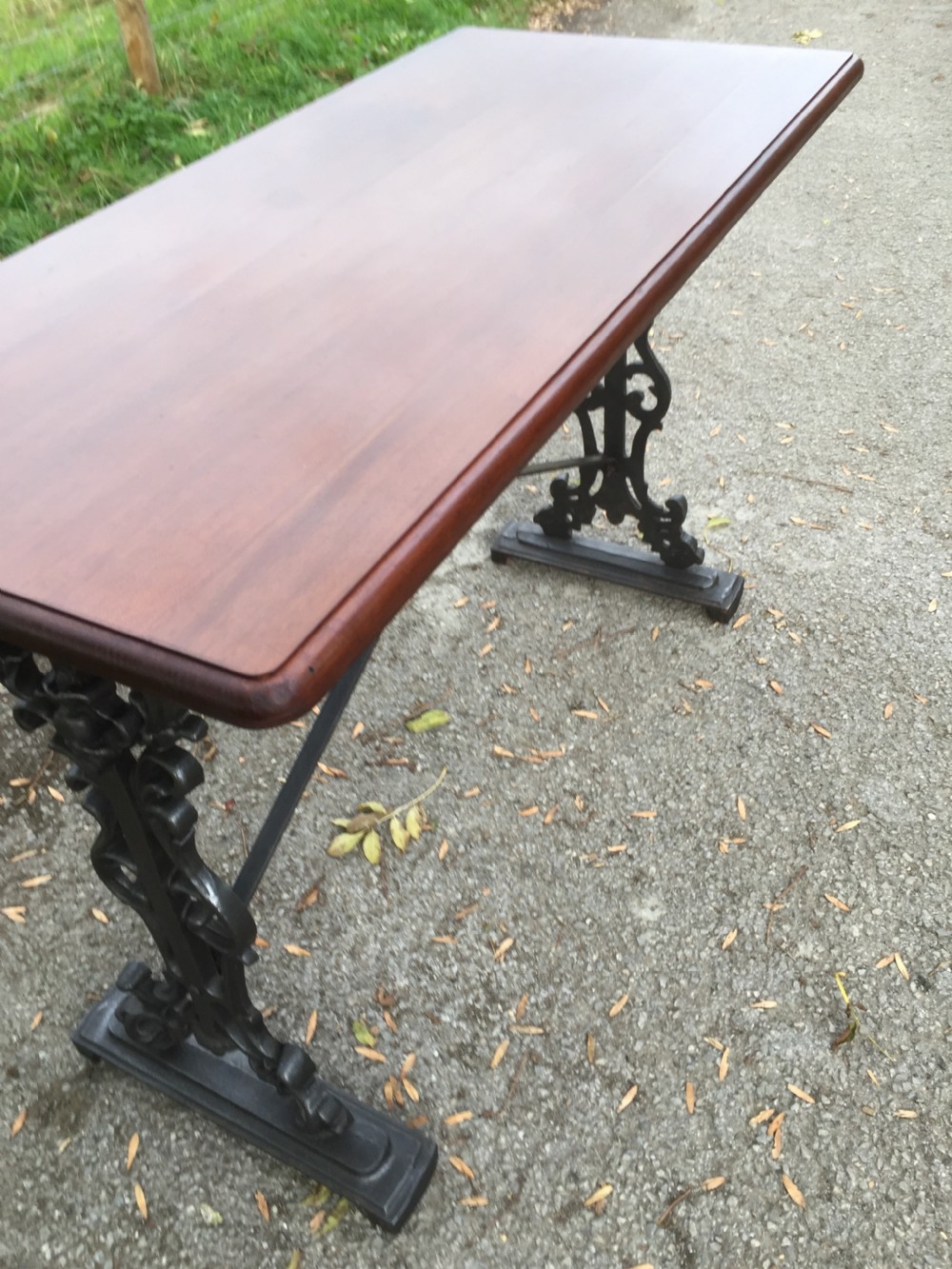 Antique cast iron pub table with mahogany top View VIII