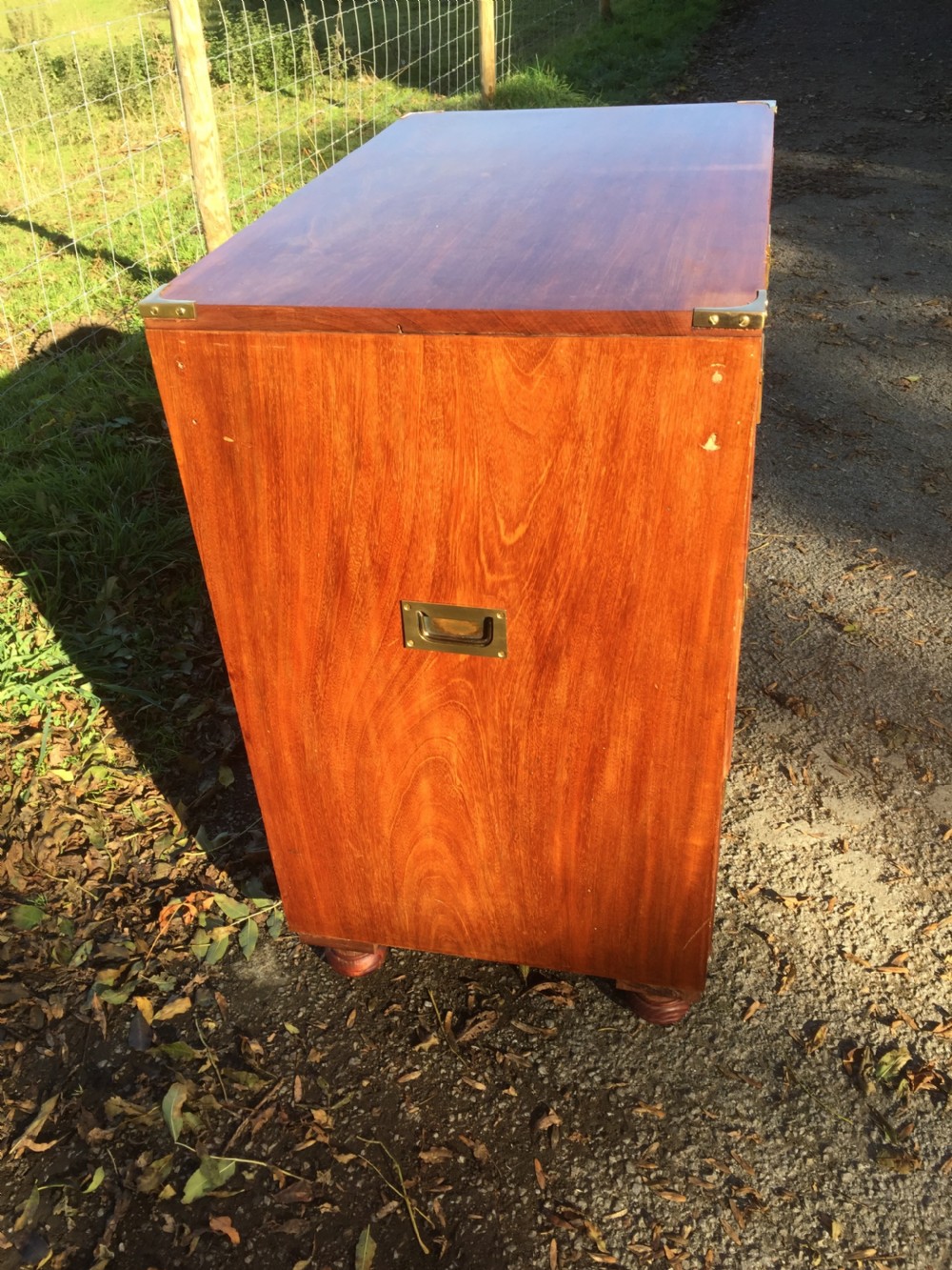 Military style three height chest of drawers on bun feet circa 1920  View IV