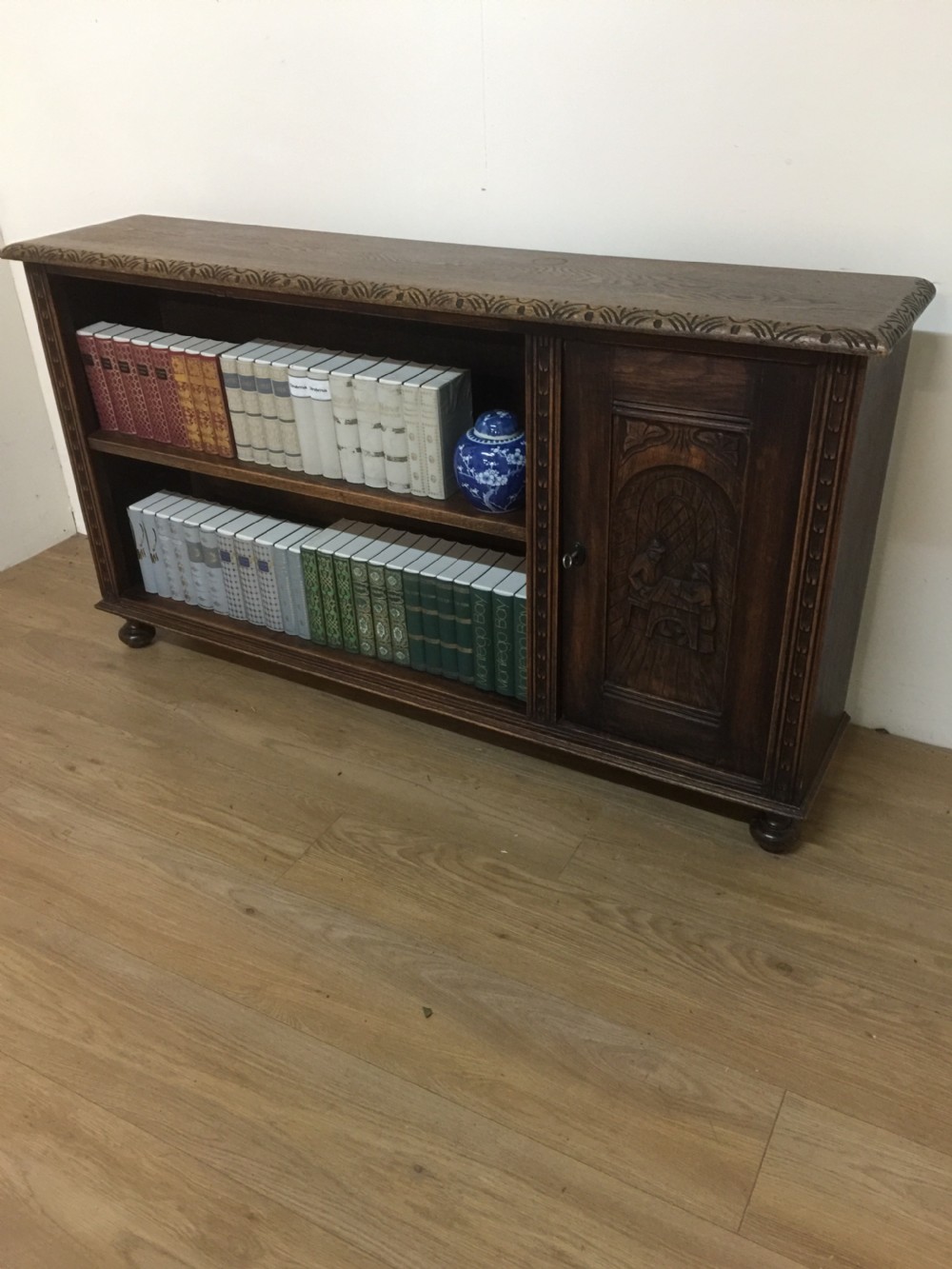 Arts and Crafts solid oak carved open bookcase