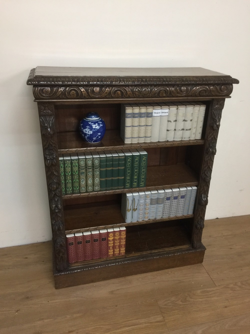 Nineteenth century carved oak open bookshelves with adjustable shelves 