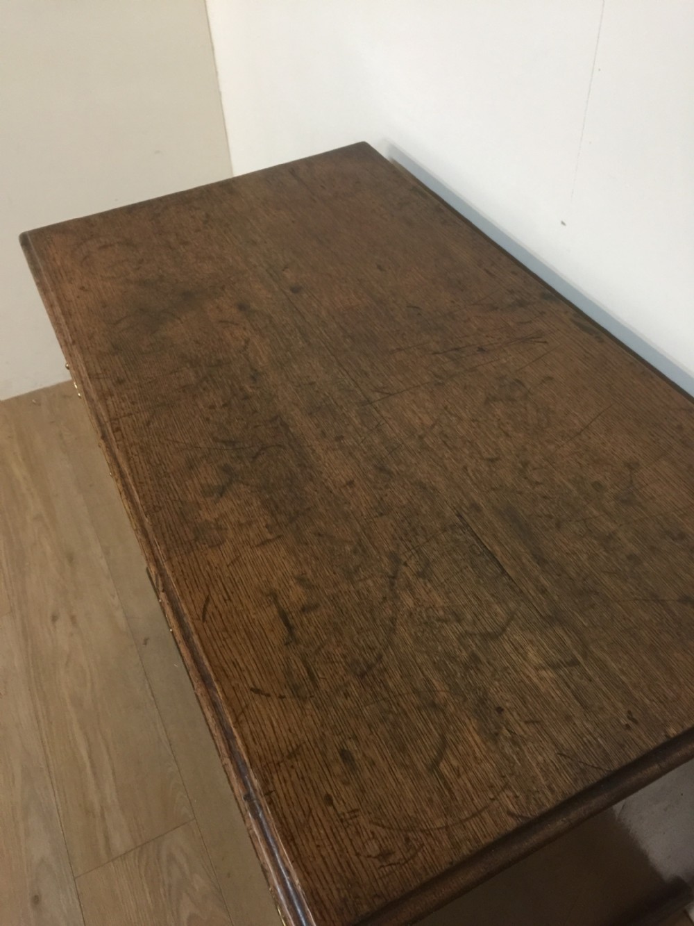 Small Georgian oak chest of drawers on bracket feet  View II