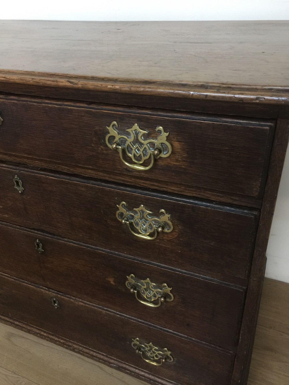Small Georgian oak chest of drawers on bracket feet  View IV