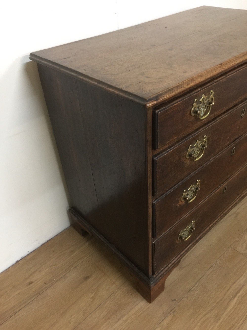 Small Georgian oak chest of drawers on bracket feet  View V