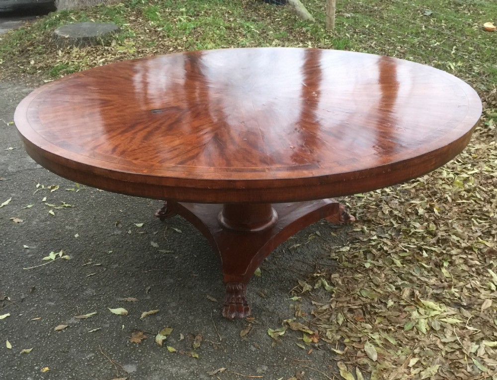 Large nineteenth century circular eight seater dining table 