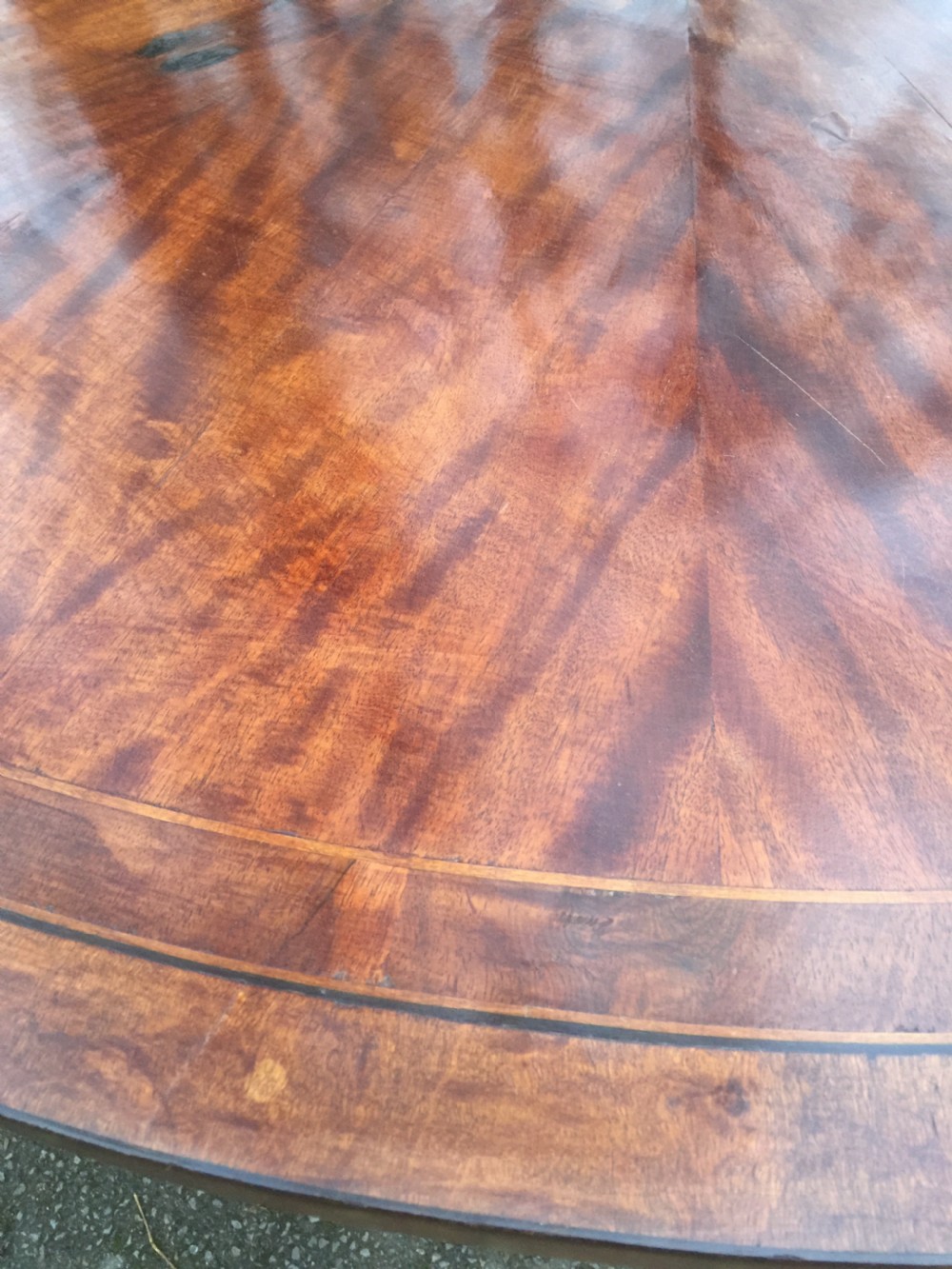 Large nineteenth century circular eight seater dining table  View VI