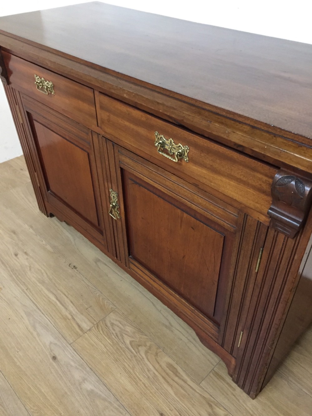 Late nineteenth century walnut dresser base  View III