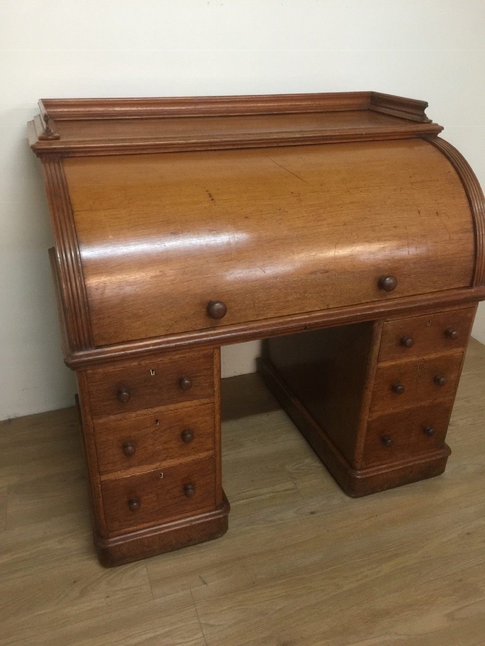 Nineteenth century golden oak cylinder desk by Carter of London