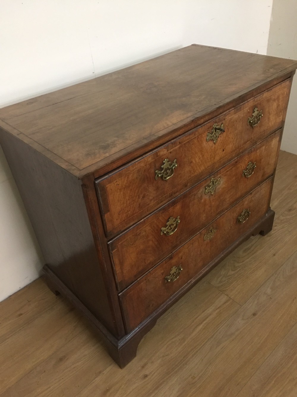 Late eighteenth century walnut crossbanded chest of drawers  View II