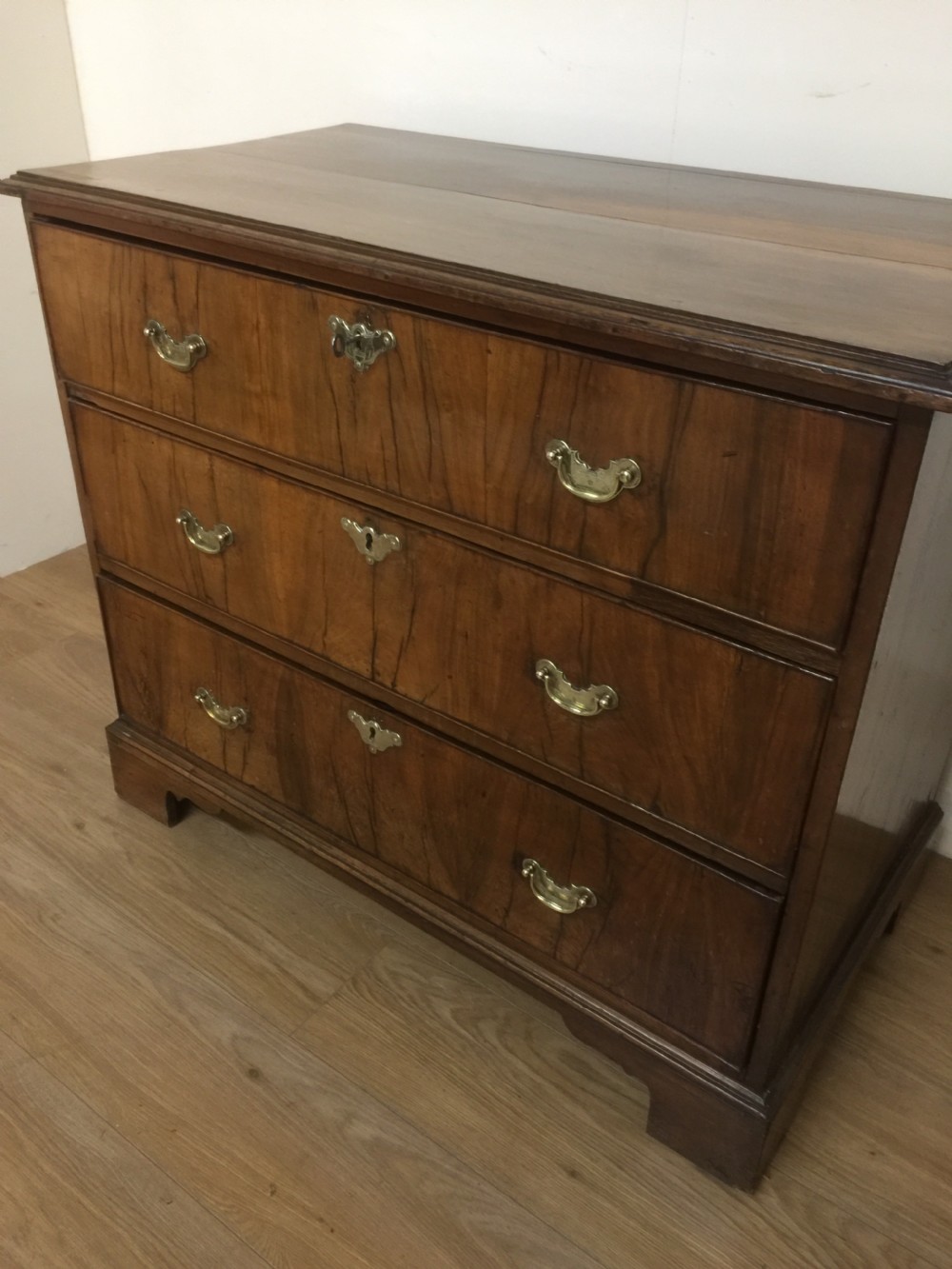 Late eighteenth century walnut three height chest of drawers  View II