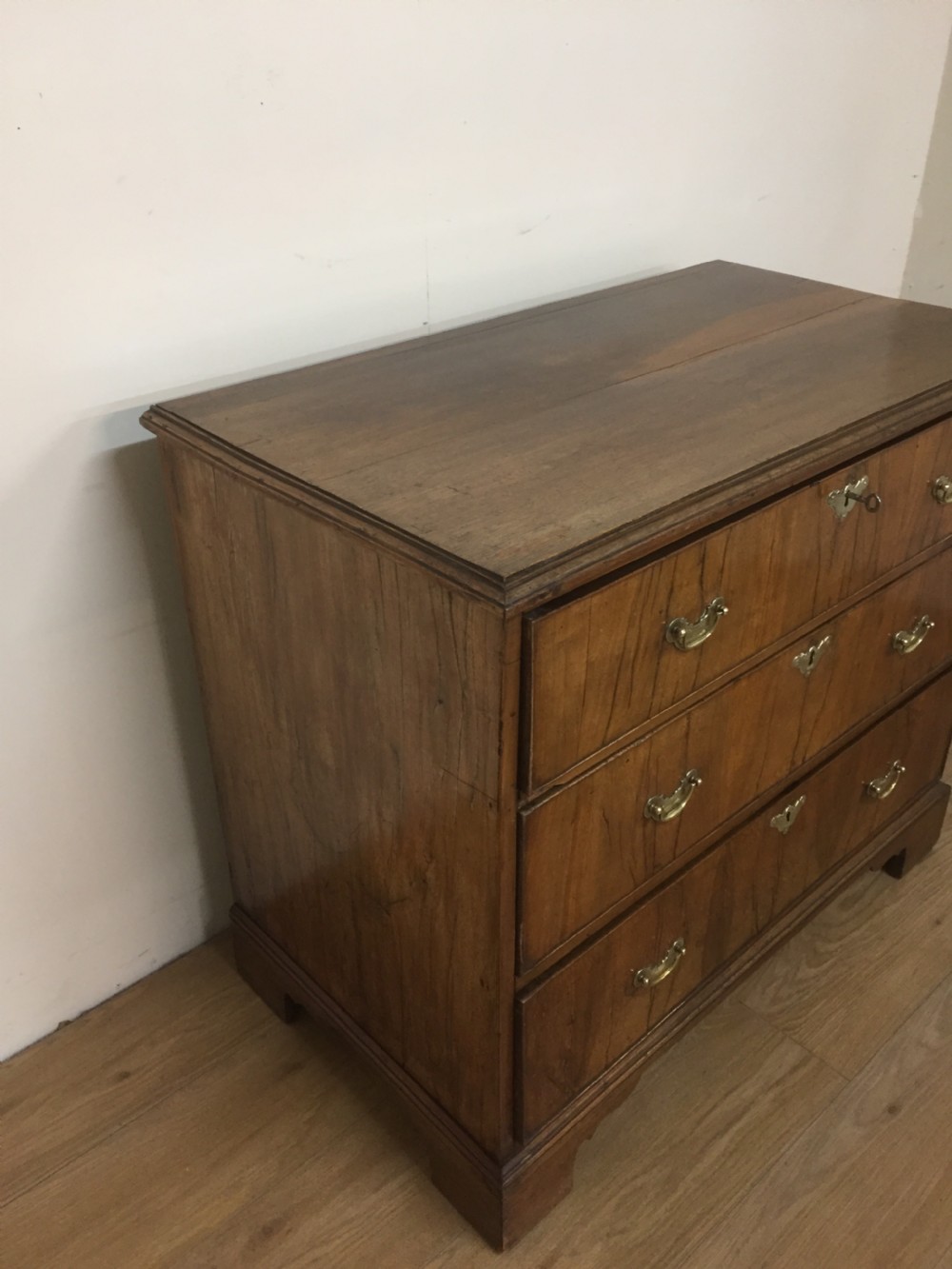 Late eighteenth century walnut three height chest of drawers  View III
