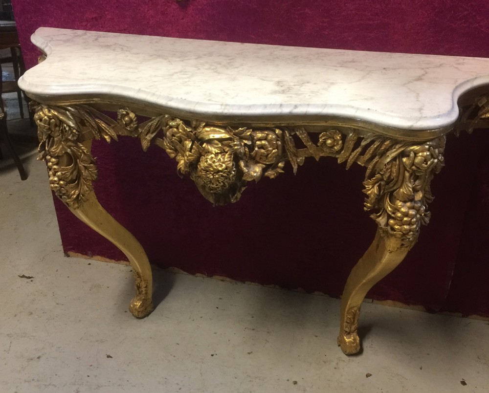 Nineteenth century gilded console table with white Carrara Marble top
