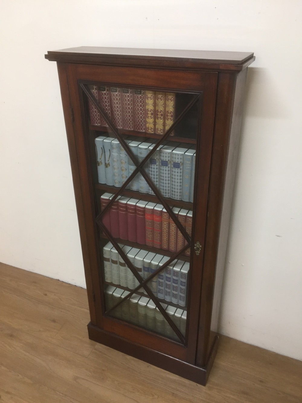 Nineteenth century mahogany freestanding glazed narrow bookcase