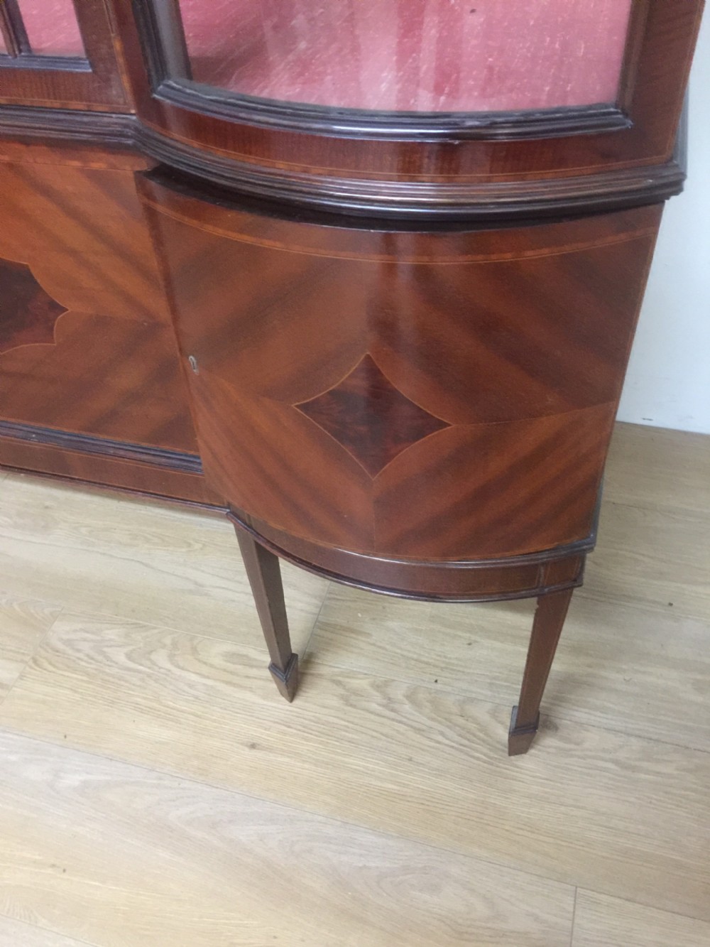 Inlaid mahogany display cabinet on tapered legs  circa 1910 View V