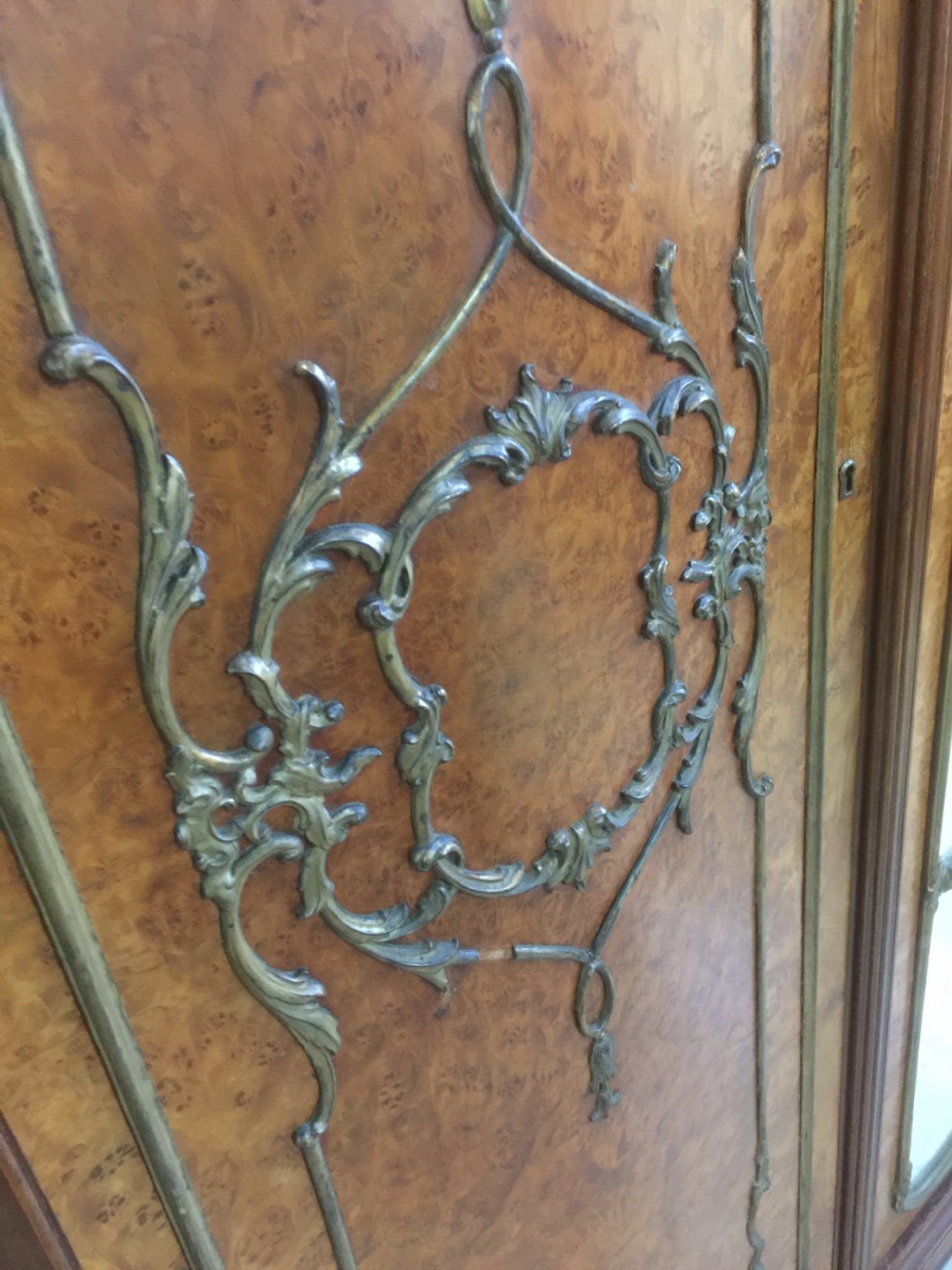 Four door burr walnut wardrobe with gilded carving circa 1920 View XIII